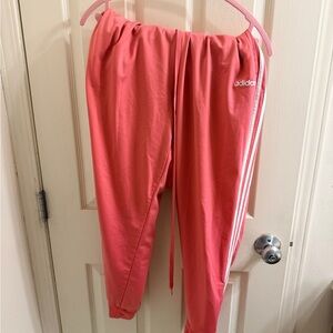 Adidas Women's Pink Joggers with White Stripes